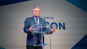 Lawrence Reed speaking at FEEcon