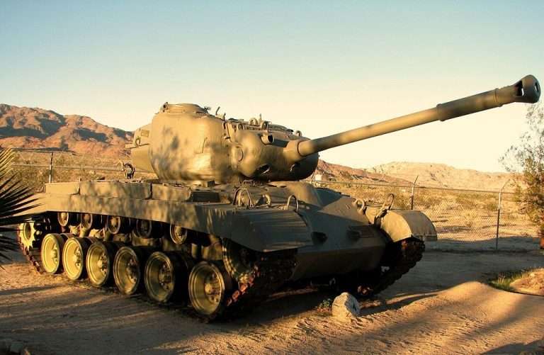 A large tank in a field.