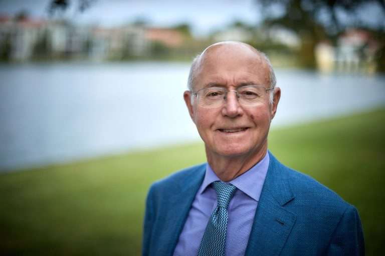 Thomas Carroll Graham in front of a pond.