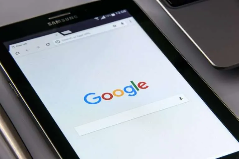 Google homepage open in Chrome browser on a tablet