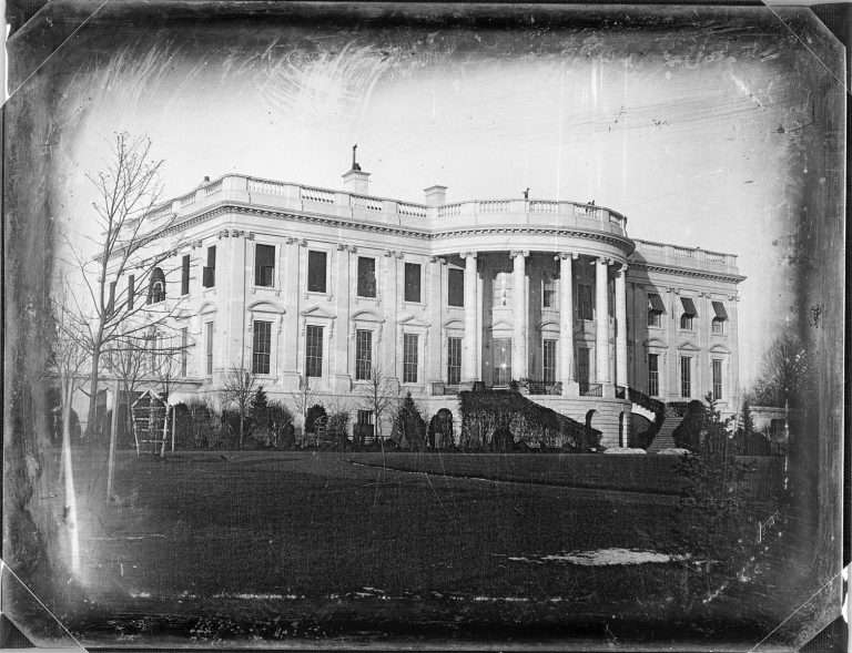 Black-and-white photo of the White House in 1846.