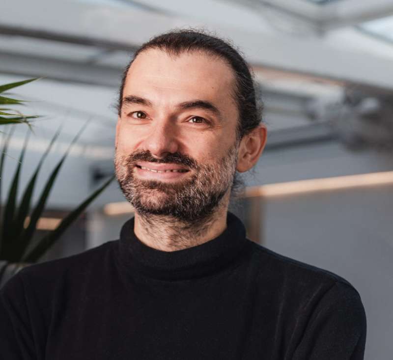 Olivier Usher, a white man with a beard