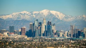 Downtown Los Angeles with mountains in the background.