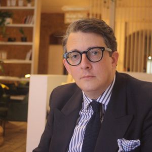 image of Eliot Wilson in a suit